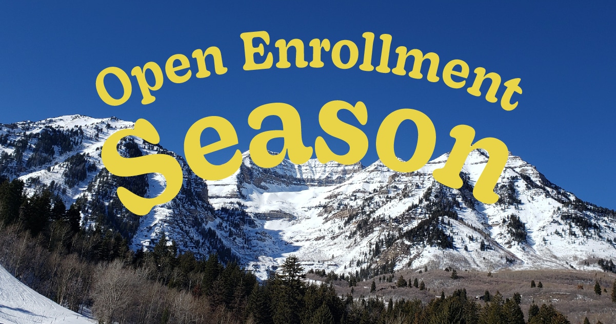 Open Enrollment Season text overlaying snow-capped mountains, representing health insurance enrollment period in Utah.