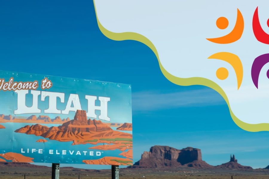Welcome to Utah sign with scenic red rock landscape and blue sky, symbolizing Medicaid unwinding context in Utah.